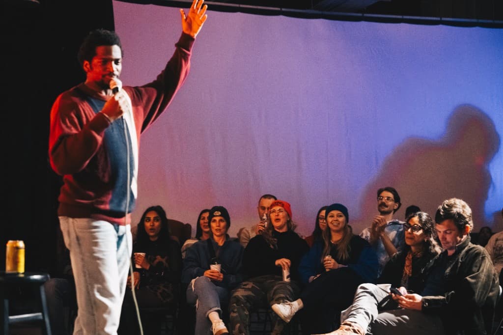 Comedian performing on stage