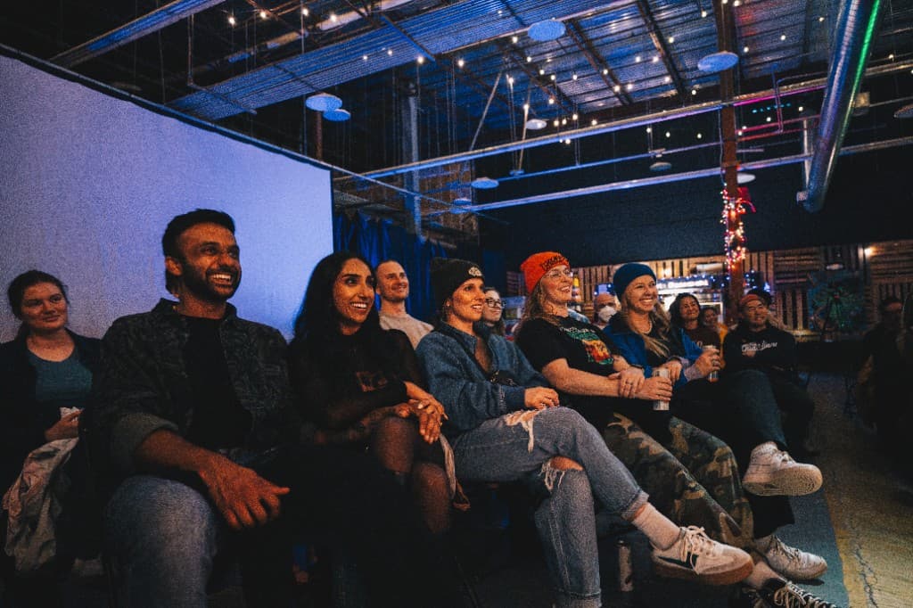Laughing audience at The Comedy Run Club