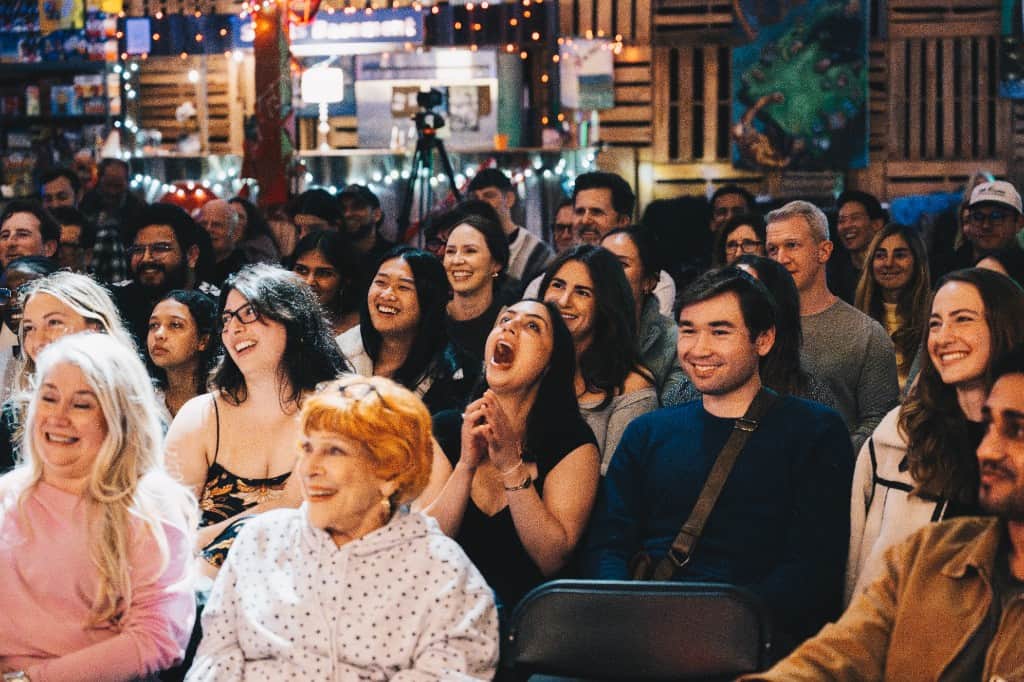 Crowd enjoying a comedy show at Sports Basement Presidio